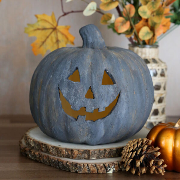 DIY terracotta jack-o-lantern.