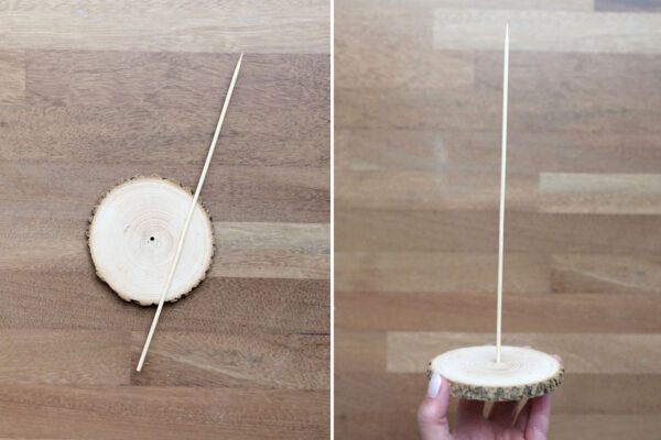 Attaching skewer to wood slice base.